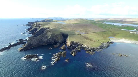 Aerial shot off the dramatic coast line of Shetland, Scotland, Stock Footage 58446626