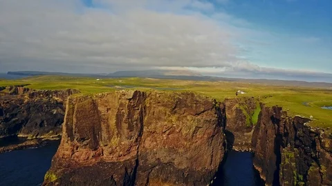Aerial shot off the dramatic coast line of Shetland, Scotland, Stock Footage 97804505
