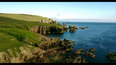 Aerial shot off the dramatic coast line of Shetland, Scotland, Stock Footage