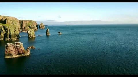 Aerial shot off the dramatic coast line of Shetland, Scotland, Stock Footage 97804935