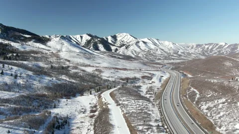 Aerial shot of drivers on Interstate 80 near Salt Lake City, Utah. Video stock 171350445