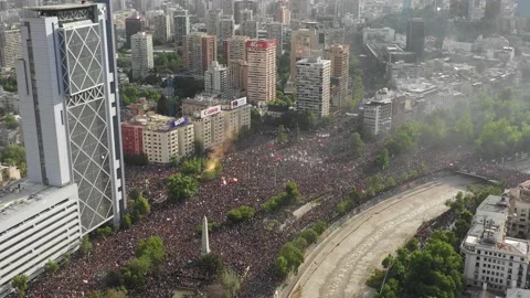 Aerial shot with drone backwards in the largest march in Chile on October 25 Stock Footage
