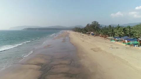 Aerial shot drone going Forward above the sandy beach. Stock Footage