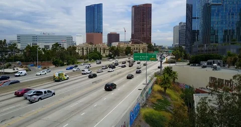 Aerial shot drone of pulling away from freeway Stock Footage 114031899