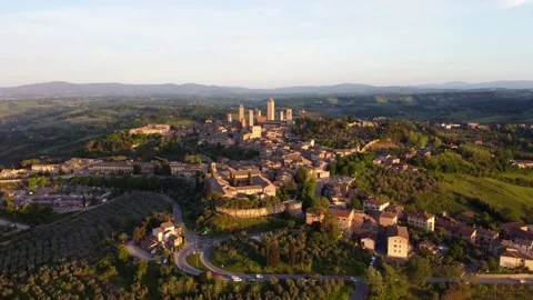 Aerial shot with the drone at sunset of the medieval town of San Gimignano Stock Footage 157763243