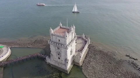 Aerial shot drone view of Belem Tower in Lisbon Portugal rotating around Stock Footage 85534004