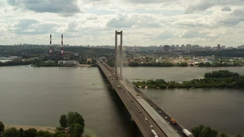 Aerial Shot drone view Flying along the south bridge in Kiev, Ukraine, where a g Stock Footage 112150367
