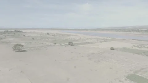 Aerial shot of dry fields and river, southern Madagascar Video stock 281859960