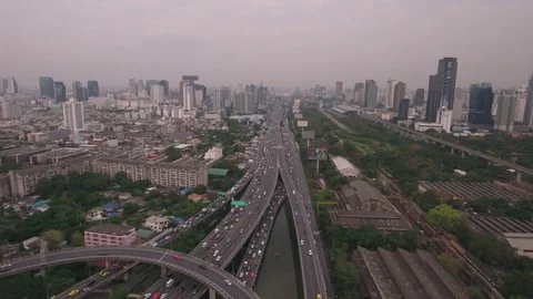 Aerial shot of elevated road intersection traffic Bangkok Thailand Stock Footage 73873601