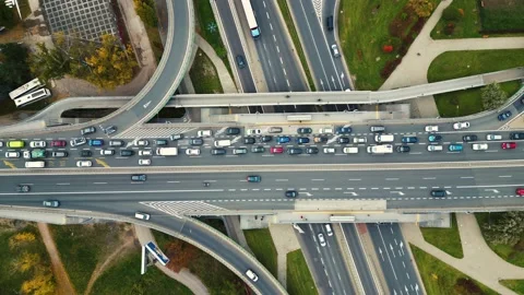 Aerial shot of elevated road junction. Drone footage of top view of Highway.. Vídeos de archivo