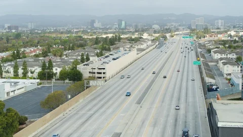 Aerial shot of empty LA highway during noon on a sunny day, USA 2020 Stock Footage 135337039