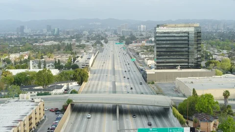 Aerial shot of empty LA highway during afternoon on a sunny day, USA 2020 Stock Footage 135339838