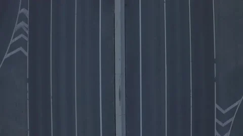 Aerial shot of empty multi-line road passing through countryside. Footage. Drone Video stock 143534291