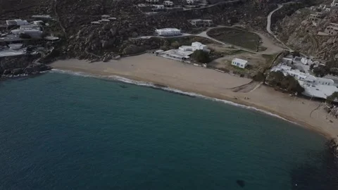 Aerial shot of empty super paradise beach Mykonos during off season, 4K. Stock Footage 156794070