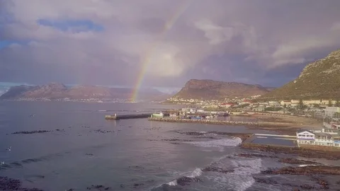 Aerial shot of the end of a rainbow Stock Footage 80725577