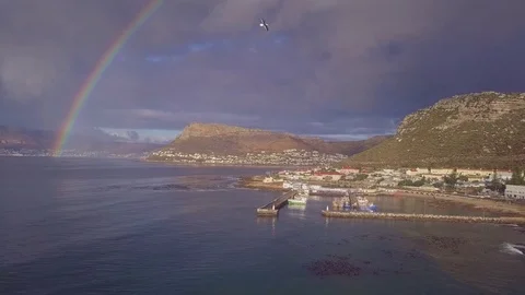 Aerial shot of the end of a rainbow Stock Footage 80725836