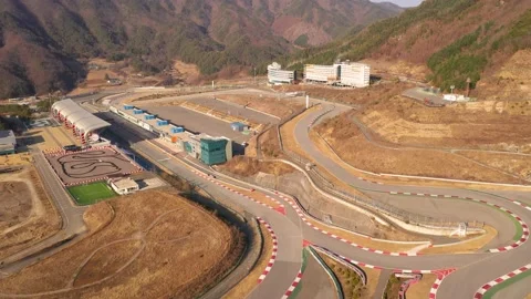 Aerial shot of fields, beach and seaside village,Jeju Island,South Korea Stock Footage 240056736
