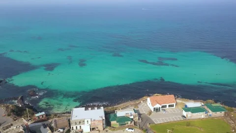 Aerial shot of fields, beach and seaside village,Jeju Island,South Korea Stock Footage 245953662