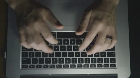 Aerial shot of fingers typing at a computer 스톡 동영상 44350294