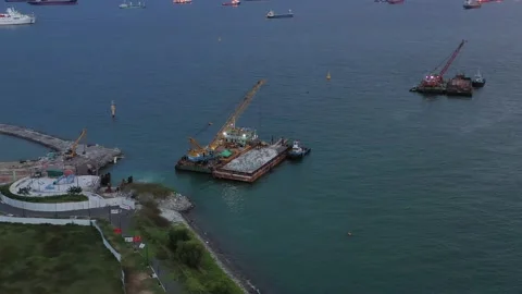 Aerial shot of floating construction crane, Singapore Stock Footage 138115157
