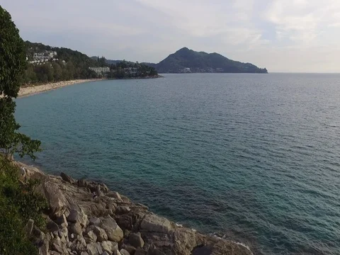 Aerial shot - fly forward, border between the stone on the beach Stock Footage 74522668