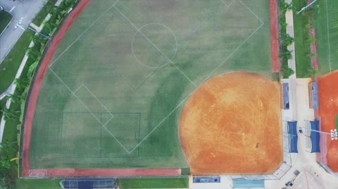 Aerial shot fly over of baseball fields at park during the day Stock Footage 69073930