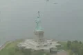 Aerial shot flying almost all the way around the Statue of Liberty Footage