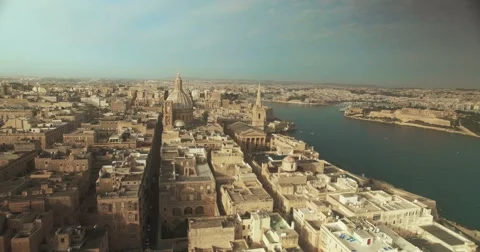 Aerial Shot - Flying backwards over a City by the City Stock Footage 61348390