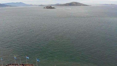 Aerial Shot Flying Backwards Over Pier 39 in San Francisco Stock Footage