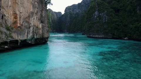 Aerial shot, flying Between limestone cliffs, Thailand, blue crystal water Stock Footage 89950035