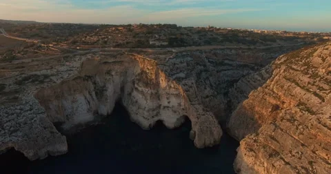 Aerial shot - Flying over Cliffs during Sunset Stock Footage 61379715