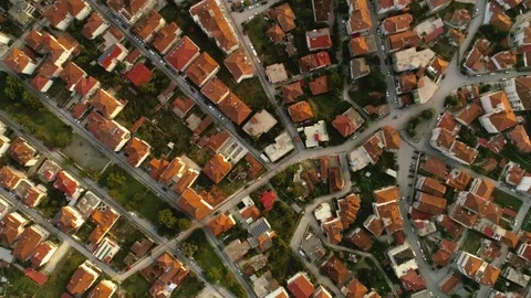 Aerial shot flying over European city or suburb at sunset top view amazing Stock Footage 94963615