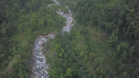 Aerial shot flying over a river surrounded by forest, in Darjeeling, India Stock Footage 194492783