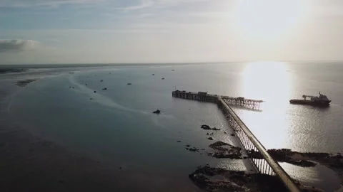 Aerial shot flying parallel to the Broome port jetty in the Northern Stock Footage 156169073