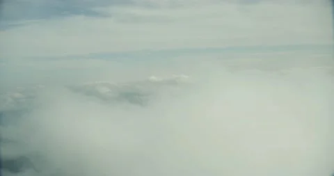 Aerial shot flying through the clouds Stock Footage 145959820
