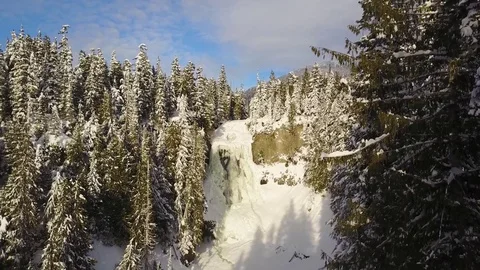 Aerial Shot Of Frozen Waterfalls On Sunny Winter Day Stock Footage