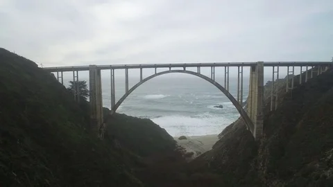 Aerial Shot Going Under Bixby Bridge to Ocean, Big Sur Stock Footage 79170920