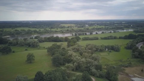 Aerial shot of Green fields and river Stock Footage 85968892