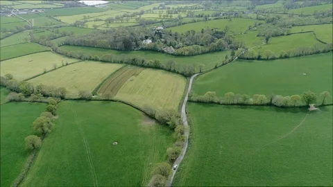 Aerial Shot Of Green Fields And Meadows In The English Countryside, East Stock Footage