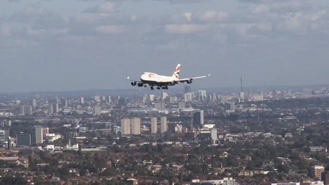 Aerial Shot, Heathrow Airport Boeing 747 400 Plane Landing On Runway 27 Stock Footage 97746871