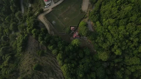 Aerial shot of a hidden temple between the dense forest. Stock Footage 249401768