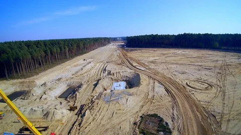 Aerial shot of highway construction during sunny day. Stock Footage 80673154