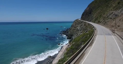 Aerial shot hovering over Pacific Coast Highway Stock Footage 76481999