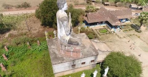Aerial shot of huge buddha statue in Ek Phnom Temple Video stock 74635687
