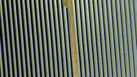 Aerial Shot of Huge Solar Array Facility for Green Electricity Generation in Stock-Footage 342855713