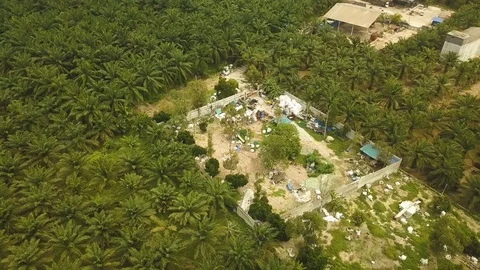 Aerial shot of illegal plastics dumping in forest,Jenjarom,Malaysia Stock Footage 112406044