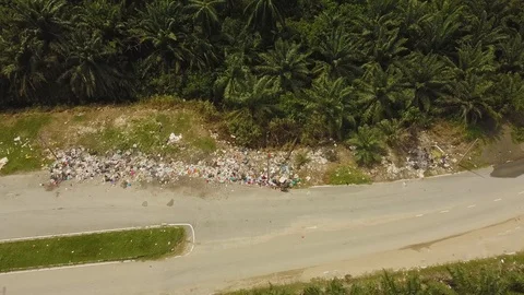 Aerial shot of illegal plastics dumping &amp; burning on road,Jenjarom,Malaysia Stock Footage 112406732