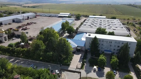 Aerial shot of an industrial site with multiple buildings Stock Footage 340240146