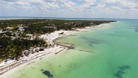 Aerial shot of Isla Holbox beachfront resorts Stock Footage 93696122