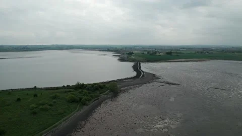 Aerial Shot of Island situated in middle of a lough / ocean / sea Stock Footage